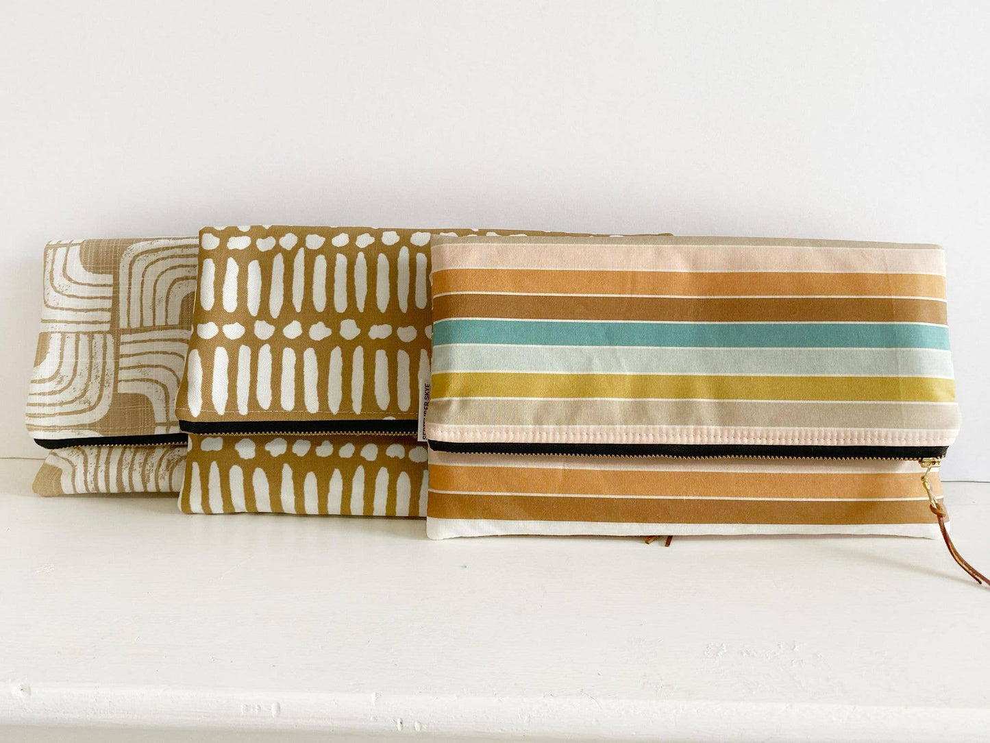 Oversized clutch bag in indybloom boho stripe