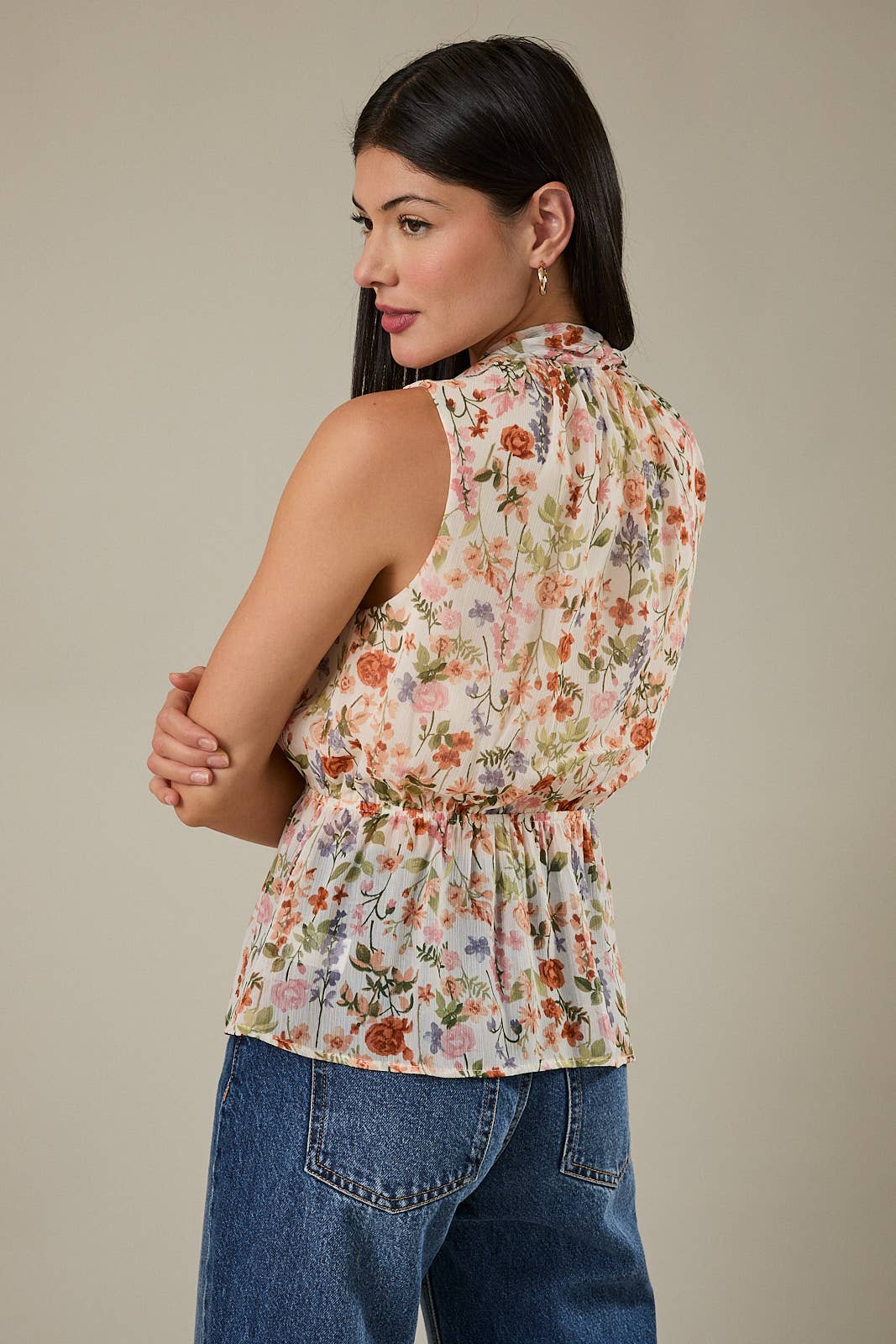 Floral Sleeveless Peplumb Top
