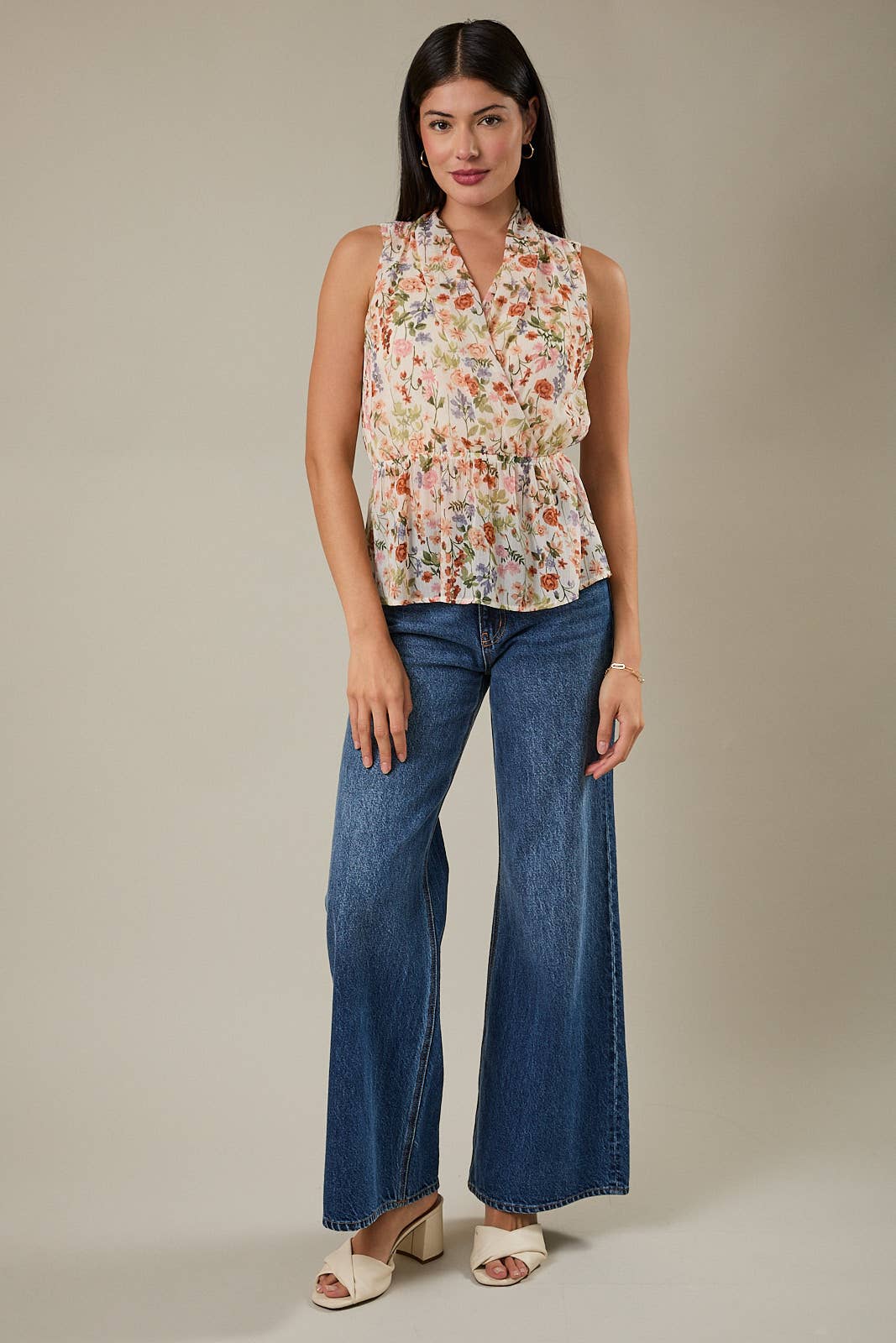 Floral Sleeveless Peplumb Top